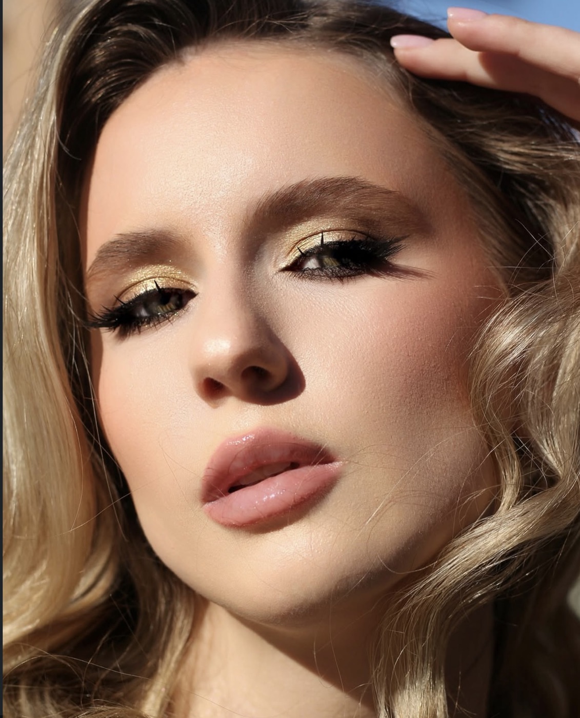 Golden glam makeup by Oksana